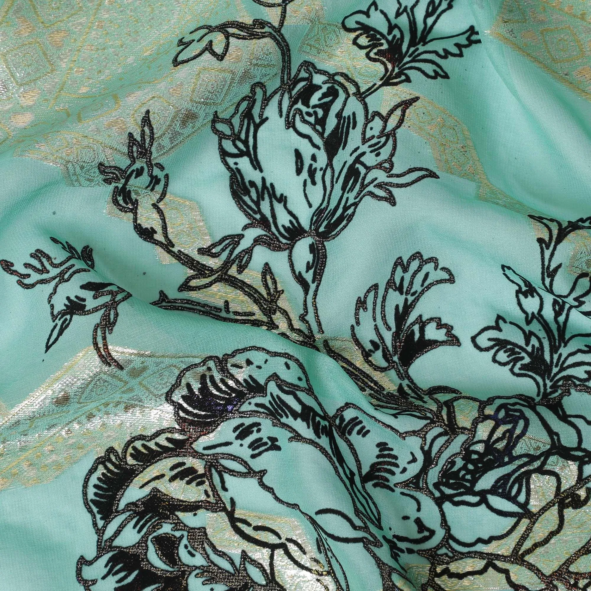 Light teal premium pure silk chiffon fabric with black flock having glitter and gold metallic lurex in floral design-D13723