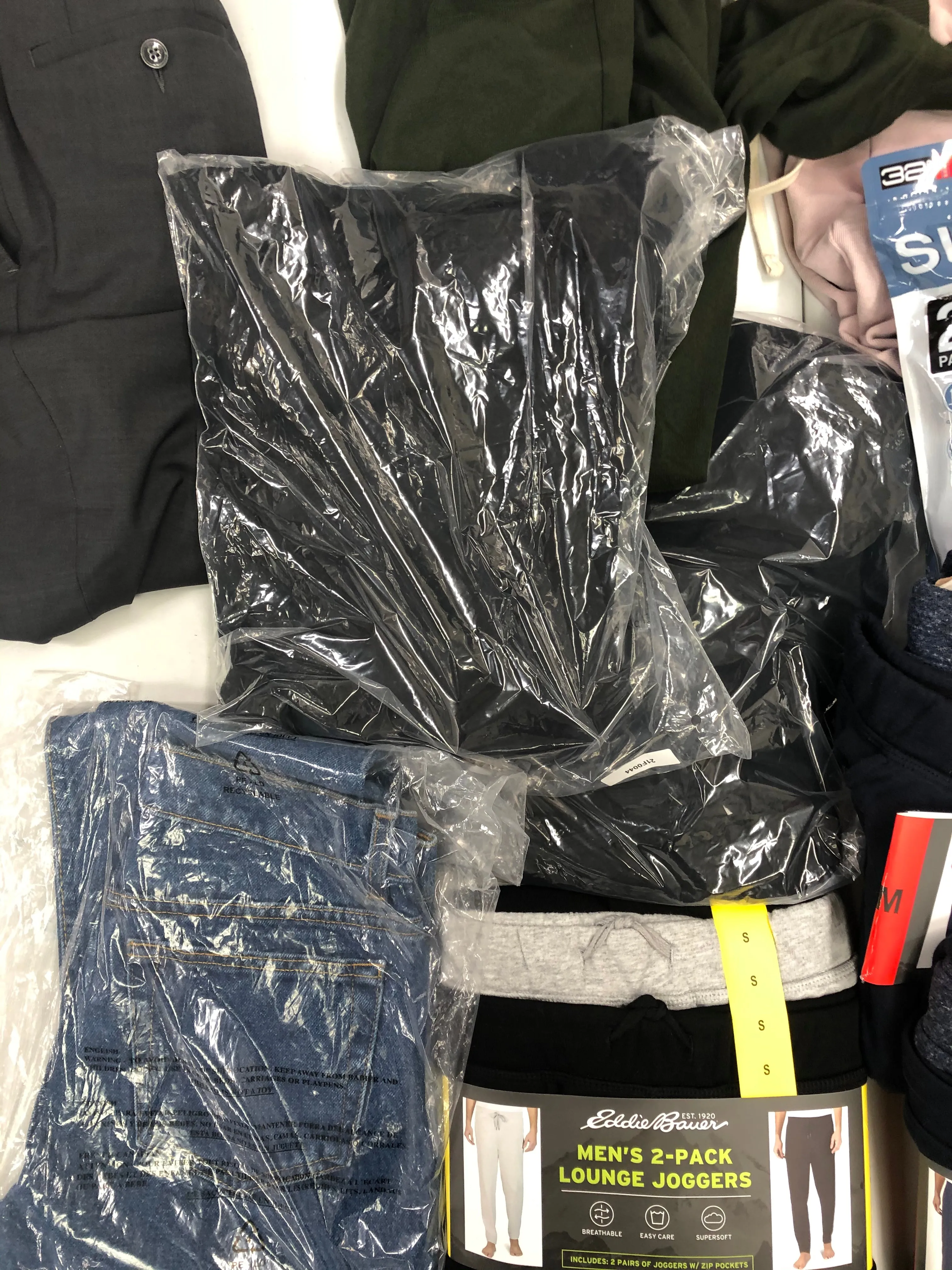 Men's Clothing Pants, Joggers and more Wholesale Lot, EDDIE BAUER, ORVIS, BAR III, AMERICAN APPAREL, STEVE MADDEN, and more, 13 items, Shelf Pulls, MSRP $692