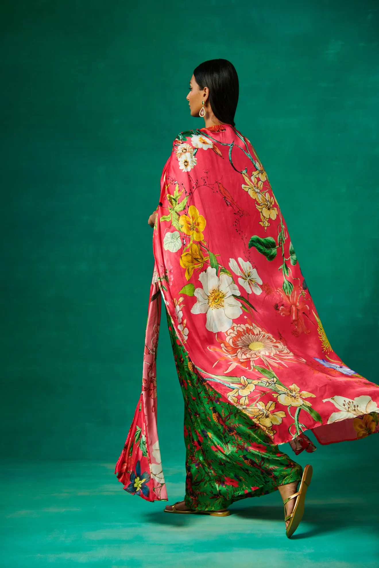 Pink cape with green bustier and pants